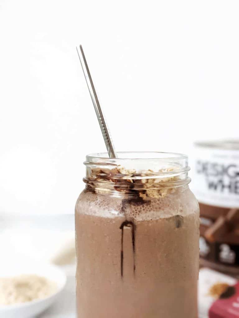 A thick and indulgent Chocolate Oatmeal Protein Smoothie made creamy with rolled oats and no banana! This double chocolate oat protein shake has cocoa powder too and is perfect for hearty and filling breakfast, post workout, or even weight loss.