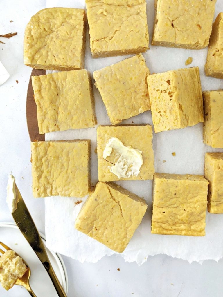 A sweet, moist, skinny High Protein Cornbread recipe to pair with a cozy chili or bbq and meet your fitness goals. Make this protein powder cornbread recipe with Greek yogurt and whole wheat flour or gluten free flour - a perfect healthy cornbread with no sugar either!