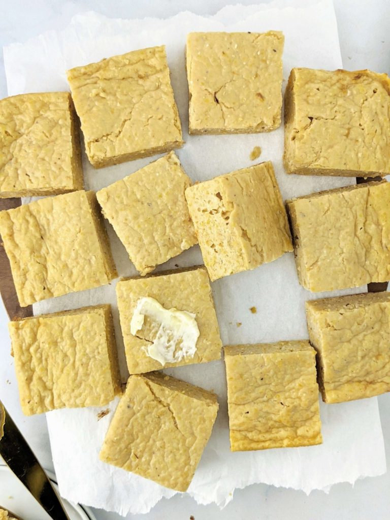 A sweet, moist, skinny High Protein Cornbread recipe to pair with a cozy chili or bbq and meet your fitness goals. Make this protein powder cornbread recipe with Greek yogurt and whole wheat flour or gluten free flour - a perfect healthy cornbread with no sugar either!