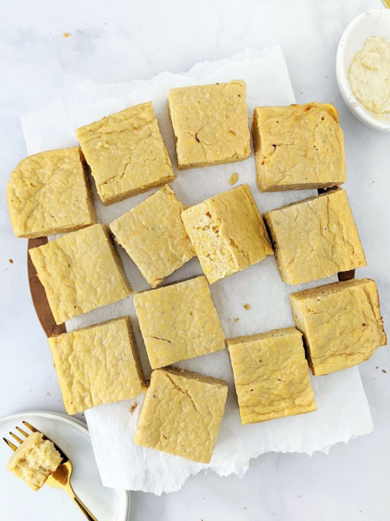 A sweet, moist, skinny High Protein Cornbread recipe to pair with a cozy chili or bbq and meet your fitness goals. Make this protein powder cornbread recipe with Greek yogurt and whole wheat flour or gluten free flour - a perfect healthy cornbread with no sugar either!