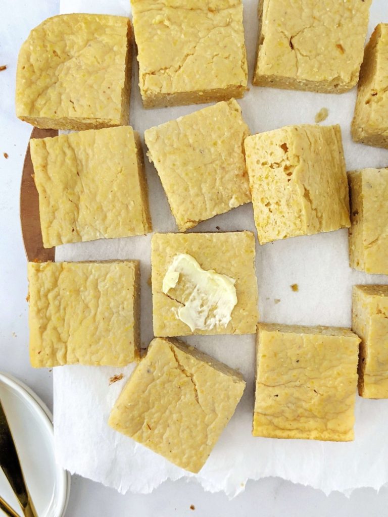 A sweet, moist, skinny High Protein Cornbread recipe to pair with a cozy chili or bbq and meet your fitness goals. Make this protein powder cornbread recipe with Greek yogurt and whole wheat flour or gluten free flour - a perfect healthy cornbread with no sugar either!