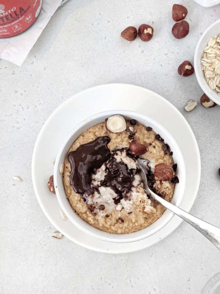 A high protein and low calorie Nutella Baked Oats perfect for a healthy breakfast or dessert! This single serve Nutella baked oatmeal is sweetened with protein powder, has no egg and can easily be made Vegan too!