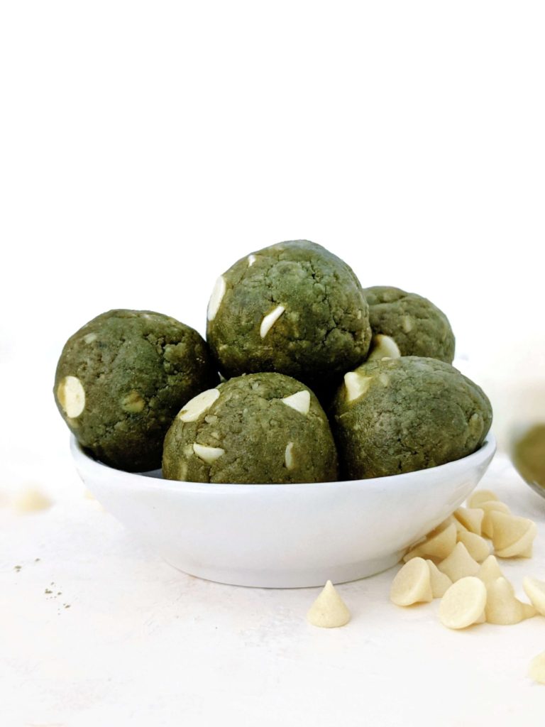 Pretty and pretty perfect Matcha Protein Balls studded with White Chocolate Chips! These green protein balls use nut butter and oats and are a great no bake snack or high protein matcha dessert. Option for a Keto matcha chocolate protein bites too!