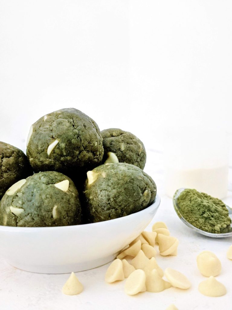 Pretty and pretty perfect Matcha Protein Balls studded with White Chocolate Chips! These green protein balls use nut butter and oats and are a great no bake snack or high protein matcha dessert. Option for a Keto matcha chocolate protein bites too!