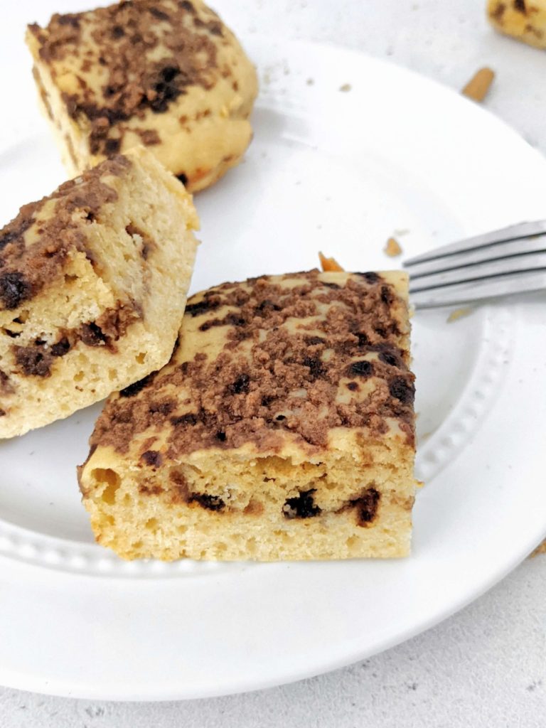 An easy Protein Coffee Cake complete with a Cinnamon Coffee Streusel, perfect for a healthy snack or dessert. Made with whole wheat pasty flour, Greek yogurt, only a little butter, and sweetened with protein powder, this recipe makes a high protein, sugar free and healthy coffee cake!