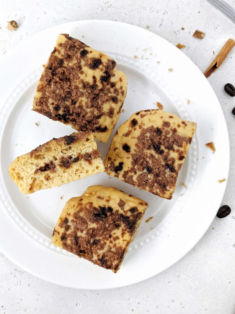 An easy Protein Coffee Cake complete with a Cinnamon Coffee Streusel, perfect for a healthy snack or dessert. Made with whole wheat pasty flour, Greek yogurt, only a little butter, and sweetened with protein powder, this recipe makes a high protein, sugar free and healthy coffee cake!