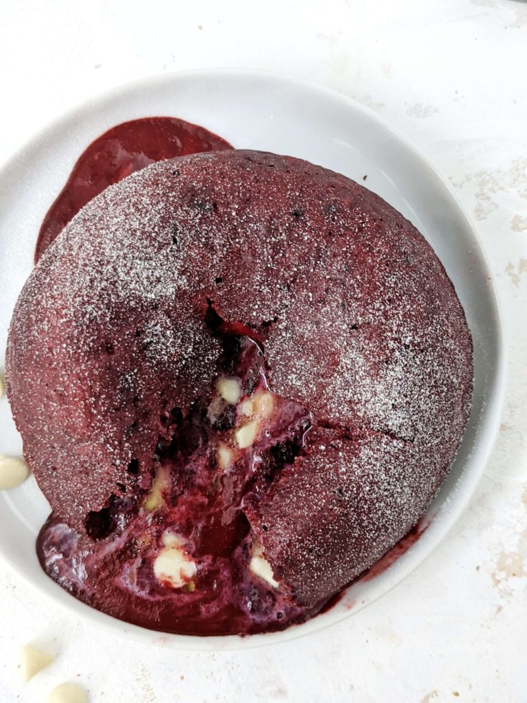 Protein Red Velvet Lava Cake - a big and indulgent dessert for one! This red velvet lava mug cake is made with whole wheat flour and sweetened with protein powder for a truly sugar free and healthy dessert!