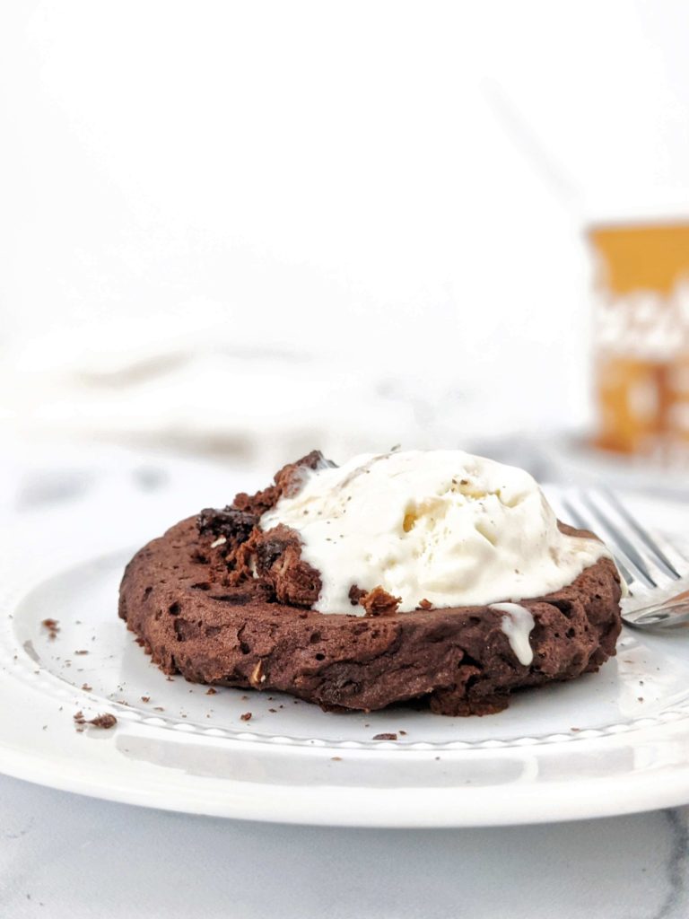 An amazing Single Serve Protein Brownie baked in the oven for the real fudgy effect. This healthy brownie for one is sweetened with protein powder and packed with Greek yogurt for the perfect single serving high protein brownie! No sugar, eggs or oil needed.