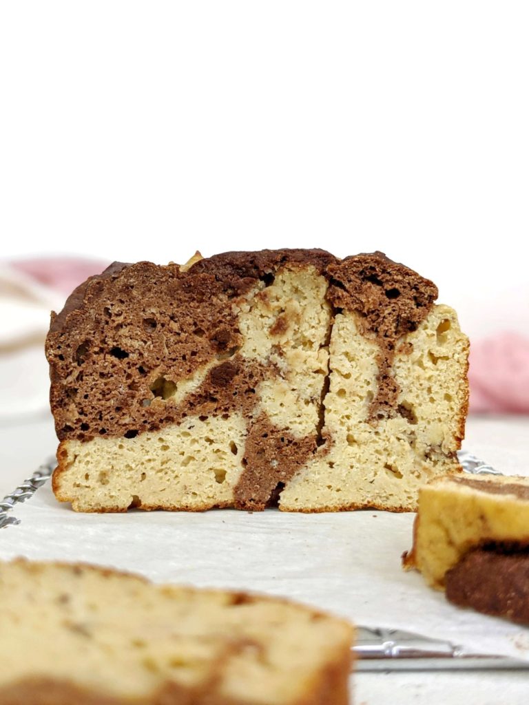 An attractive Marbled Protein Banana Bread made healthy with no oil, butter or sugar! This healthy chocolate swirl protein banana bread uses whole wheat pastry flour, Greek yogurt, protein powder and cocoa powder for all the flavor with no health compromises.