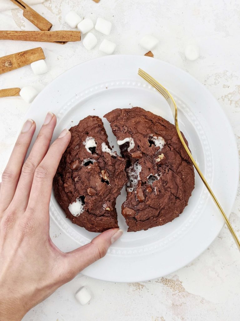 This Mexican Hot Chocolate Protein Cookie with marshmallows is just so good, but good for you! A healthy hot chocolate cookie with the spicy Mexican flavor and sweetened with protein powder; Vegan option too!