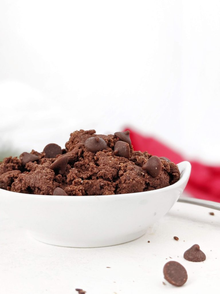 A rich and indulgent Triple Chocolate Protein Cookie Dough for one with cocoa, chocolate spread, protein powder and choco chips too! Single serve edible chocolate cookie dough is the perfect healthy and high protein dessert for the ultimate chocolate lover.