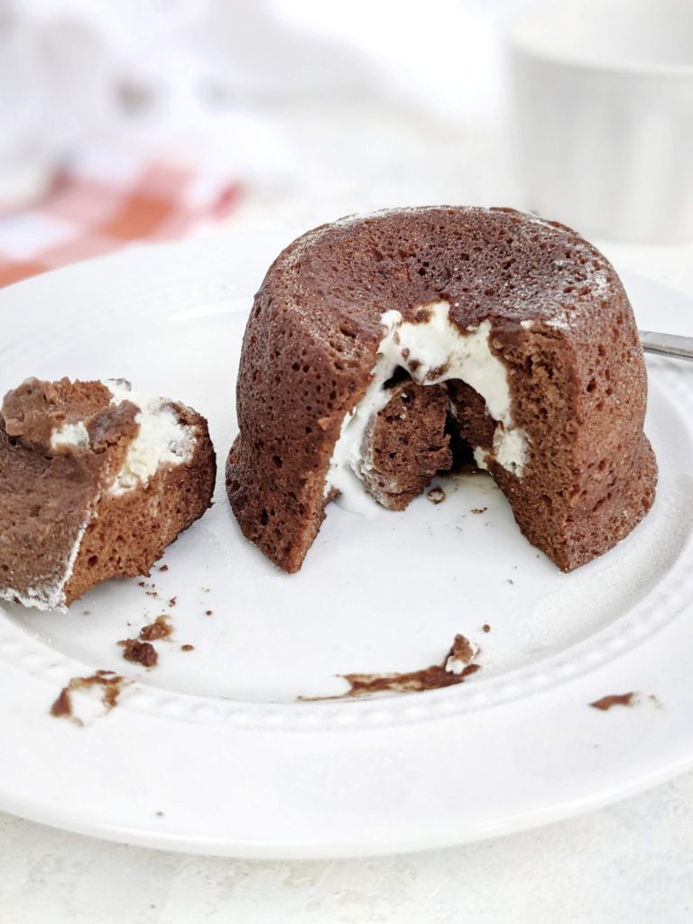 Get 2 desserts in 1 and for one with this Chocolate Cheesecake Protein Mug Cake, but still keep it sugar free and healthy. A high protein chocolate cream cheese mug cake made with whole wheat pastry flour and protein powder, and filled with a low fat Greek yogurt-cream cheese mixture.