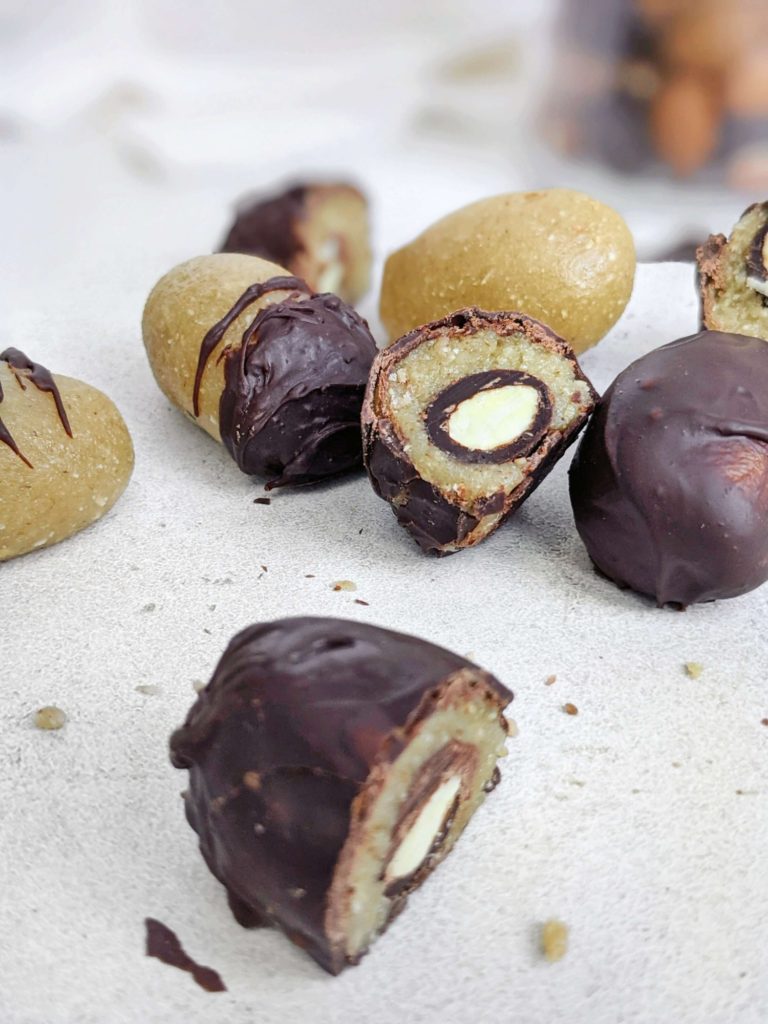 Perfect Chocolate Covered Almond Protein Balls made with the actual chocolate coated candy! These almond flour or ground almond protein balls are sweetened with protein powder and great for a snack with an energy boost!