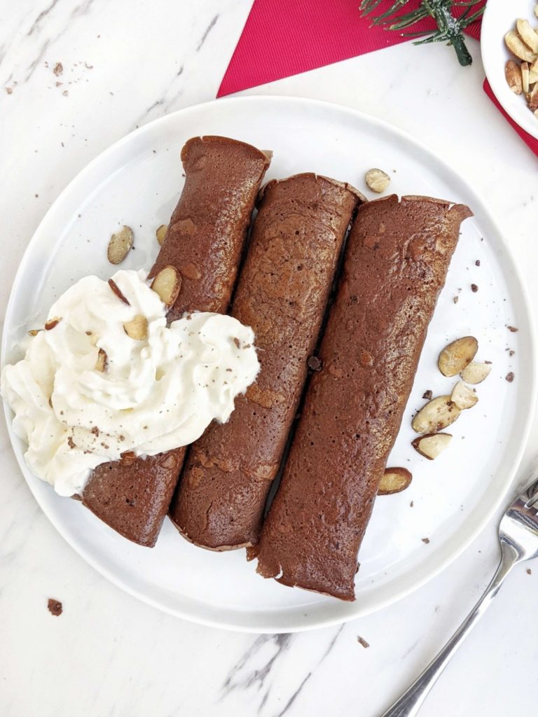 Unbelievable Chocolate Protein Crepes made with just 4 ingredients; No flour or sugar needed. These chocolate protein powder crepes are gluten free, dairy free, low carb, keto and easily Vegan too; The perfect breakfast, dessert or post workout treat.
