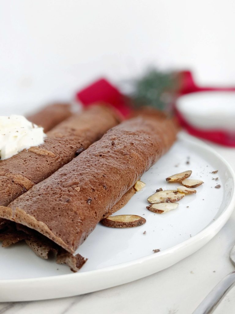 Unbelievable Chocolate Protein Crepes made with just 4 ingredients; No flour or sugar needed. These chocolate protein powder crepes are gluten free, dairy free, low carb, keto and easily Vegan too; The perfect breakfast, dessert or post workout treat.