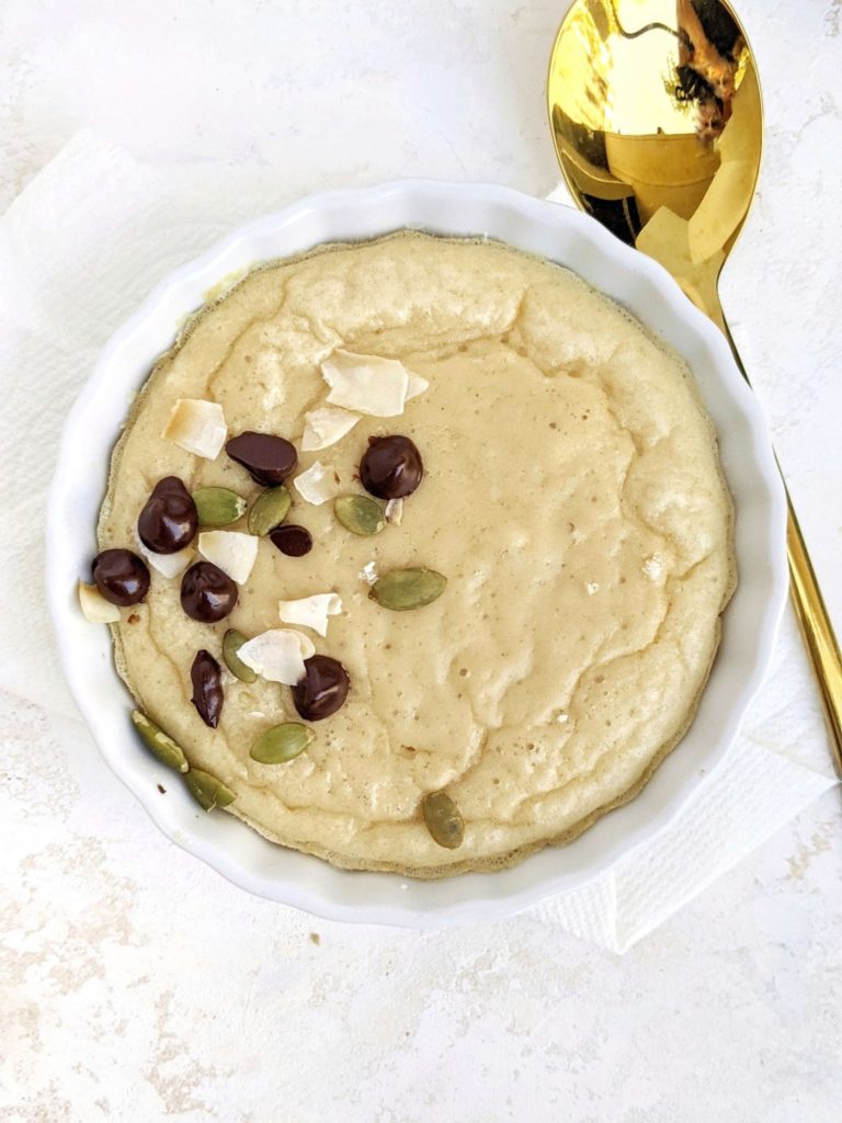 Half Baked Protein Cookie Pot for one; A single serve protein powder dessert that’s healthy and sugar free. Make this hot half baked cookie dough recipe for a quick solo indulgence or to share for two.
