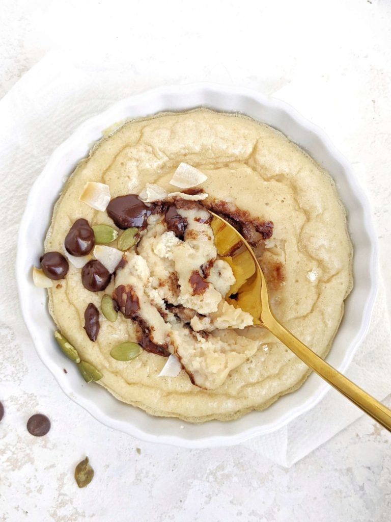 Half Baked Protein Cookie Pot for one; A single serve protein powder dessert that’s healthy and sugar free. Make this hot half baked cookie dough recipe for a quick solo indulgence or to share for two.
