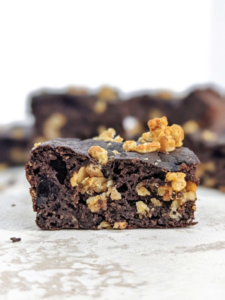 Rich and healthy Oatmeal Protein Brownies made with oat flour and granola mix-in truly are a dessert for breakfast! Low calorie oat flour protein brownies use cocoa powder and chocolate protein powder and have no eggs either.
