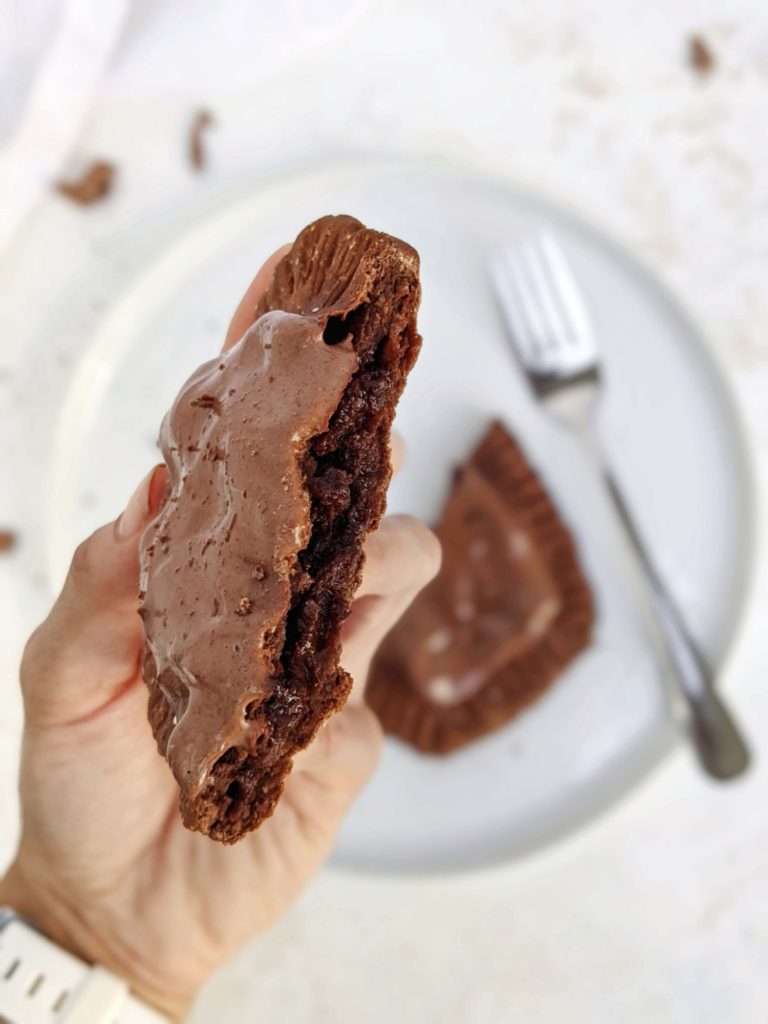 Supremely rich Triple Chocolate Protein Pop Tarts with a chocolate pastry dough, chocolate fudge filling, and frosting - all with protein powder as well! A perfect healthy homemade chocolate fudge pop tart that’s high in protein, gluten free, sugar free and Vegan too.