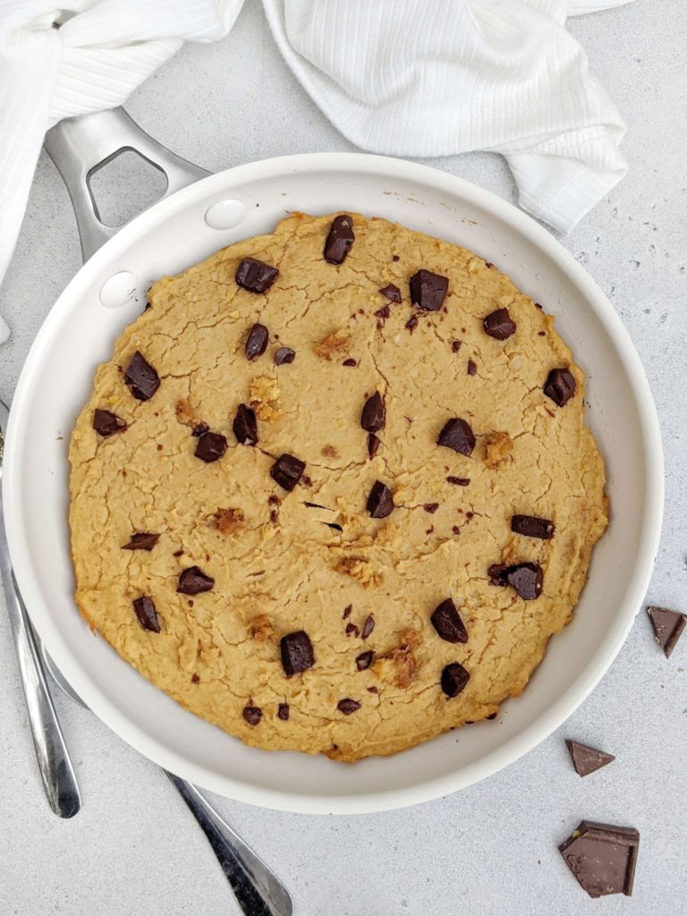 An amazing Chickpea Protein Skillet Cookie for a gluten free and Vegan treat. This healthy skillet cookie is a great chickpea protein powder dessert recipe to satisfy those cravings.