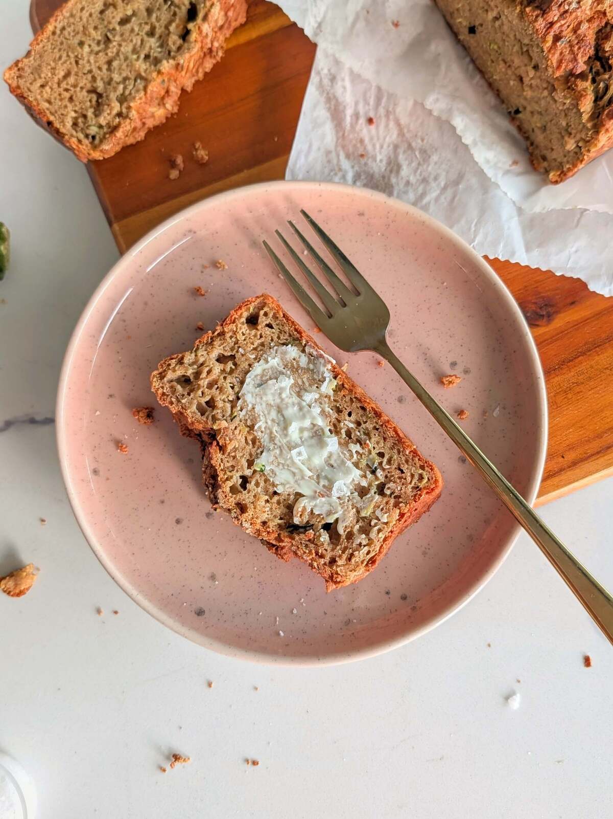 This protein zucchini bread is high protein, low fat and low sugar, with a crackly sugar top and 10g of protein a slice — good for breakfast, a snack, or after a heavy lifting session at the gym.