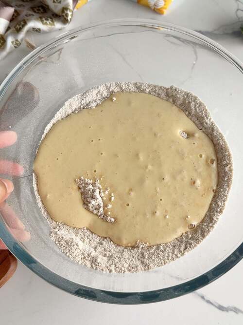 Pour wet mix into dry