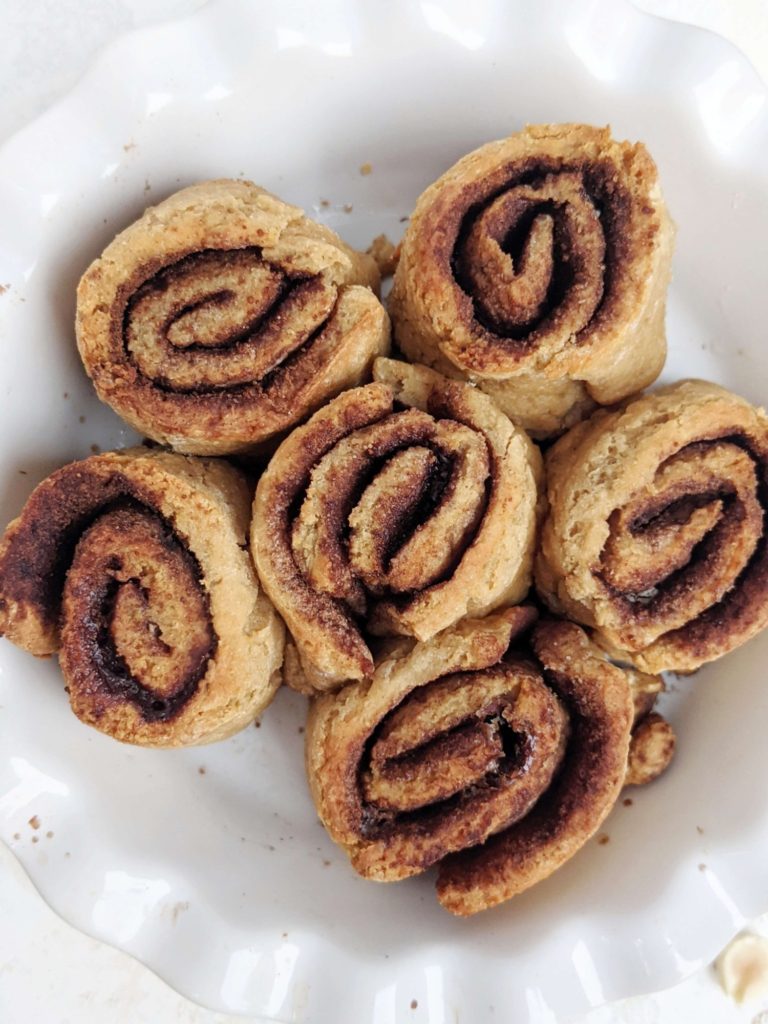 Super easy Peanut Butter Protein Cinnamon Rolls with a peanut butter frosting for a beautiful and sweet breakfast! These peanut butter cinnamon rolls use peanut butter powder, protein powder and Greek yogurt, and make healthy, low calorie breakfast rolls!