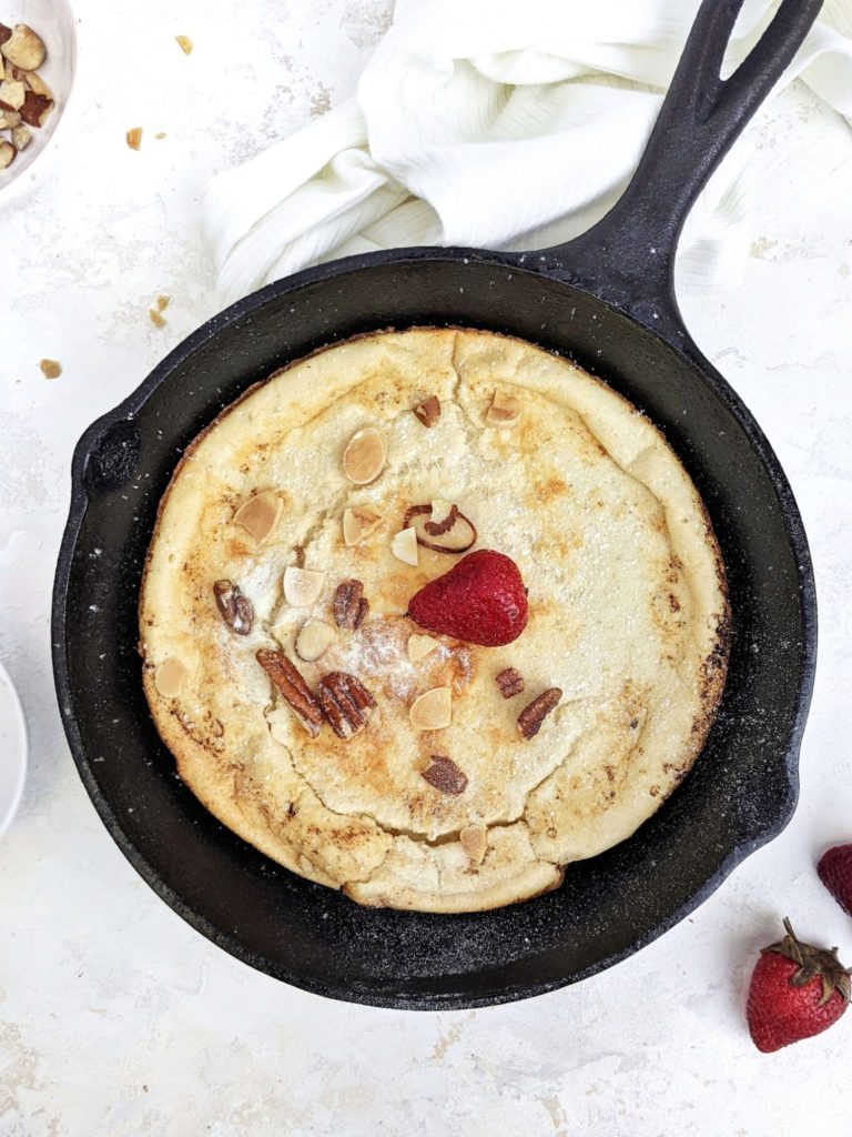 A big and extra high Protein Dutch Baby Pancake made with protein powder, Greek yogurt and an extra egg white too! This recipe for protein German pancakes is healthy, sugar free, and actually easy; The perfect breakfast or post workout meal.
