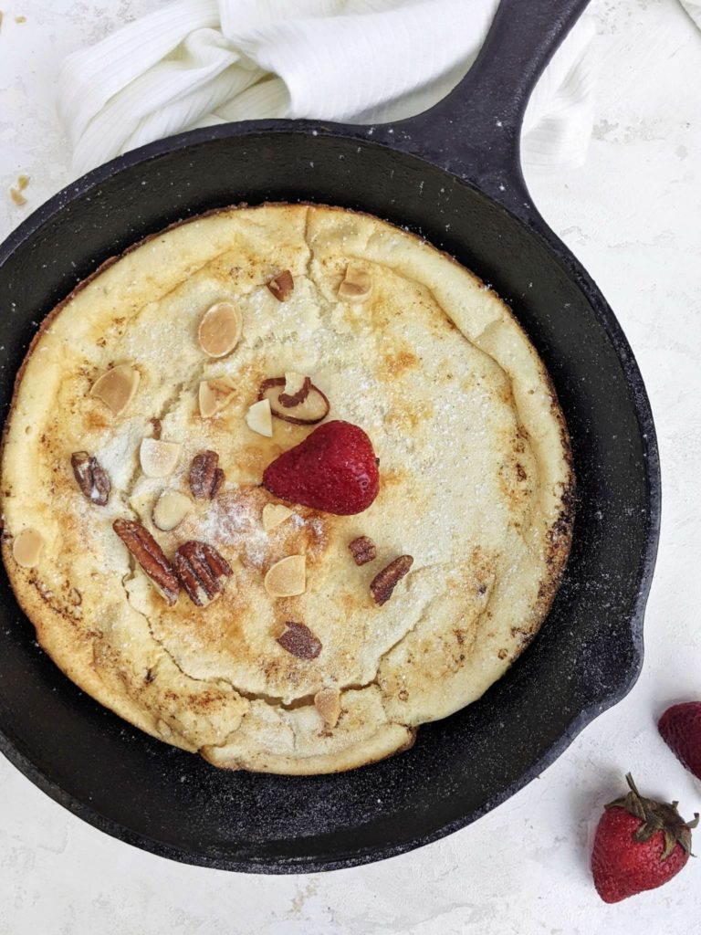 A big and extra high Protein Dutch Baby Pancake made with protein powder, Greek yogurt and an extra egg white too! This recipe for protein German pancakes is healthy, sugar free, and actually easy; The perfect breakfast or post workout meal.