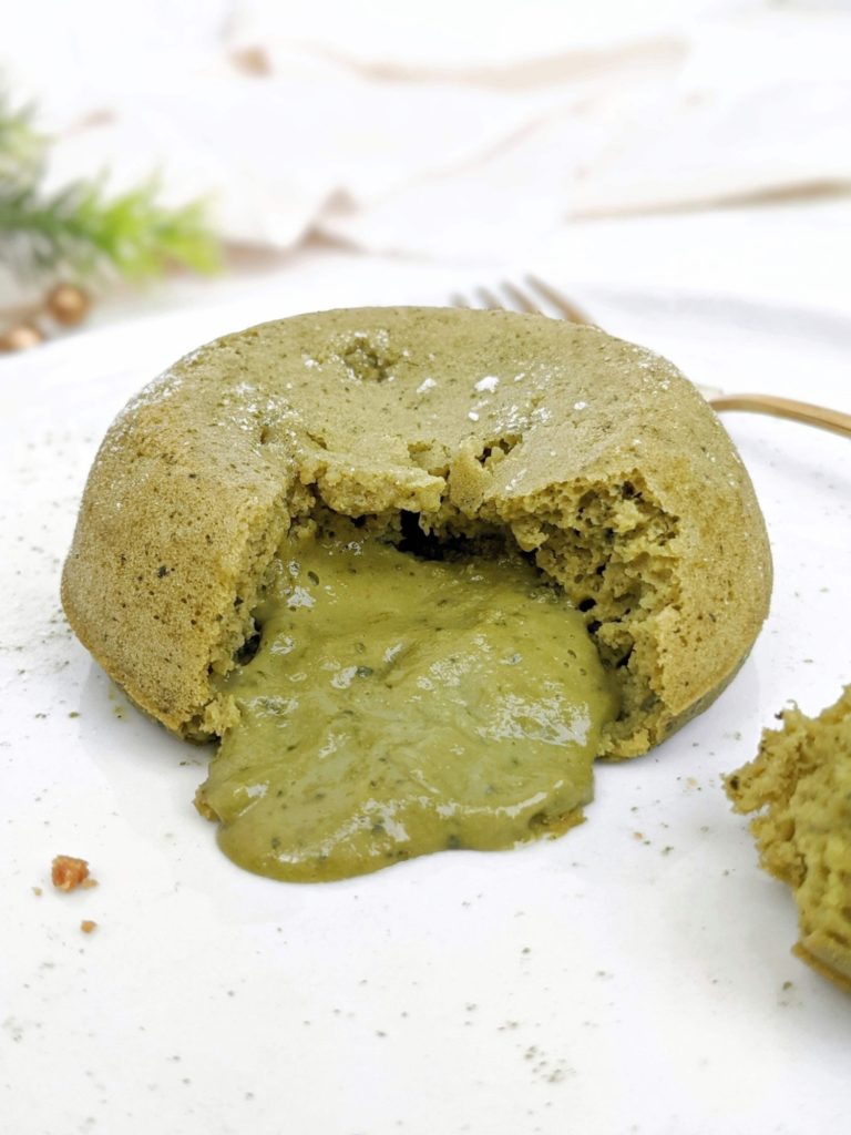 A truly simple Protein Matcha Lava Cake with protein powder and Greek Yogurt, but no white chocolate - low calorie, sugar and fat free! This molten lava matcha protein mug cake is moist, has the green tea flavor, but is healthy and easily Vegan too.