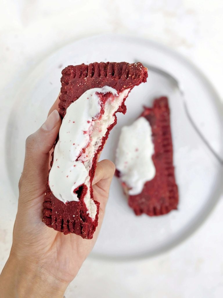 Spot-on Red Velvet Protein Pop Tarts with a Greek yogurt-protein powder filling and frosting, just like the cupcake! Homemade red velvet pop tart is healthy, high protein, sugar free and easily Vegan too!