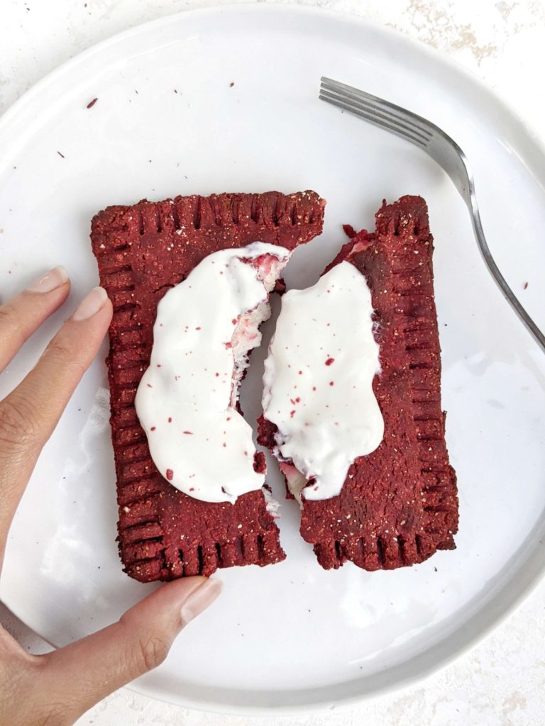 Spot-on Red Velvet Protein Pop Tarts with a Greek yogurt-protein powder filling and frosting, just like the cupcake! Homemade red velvet pop tart is healthy, high protein, sugar free and easily Vegan too!