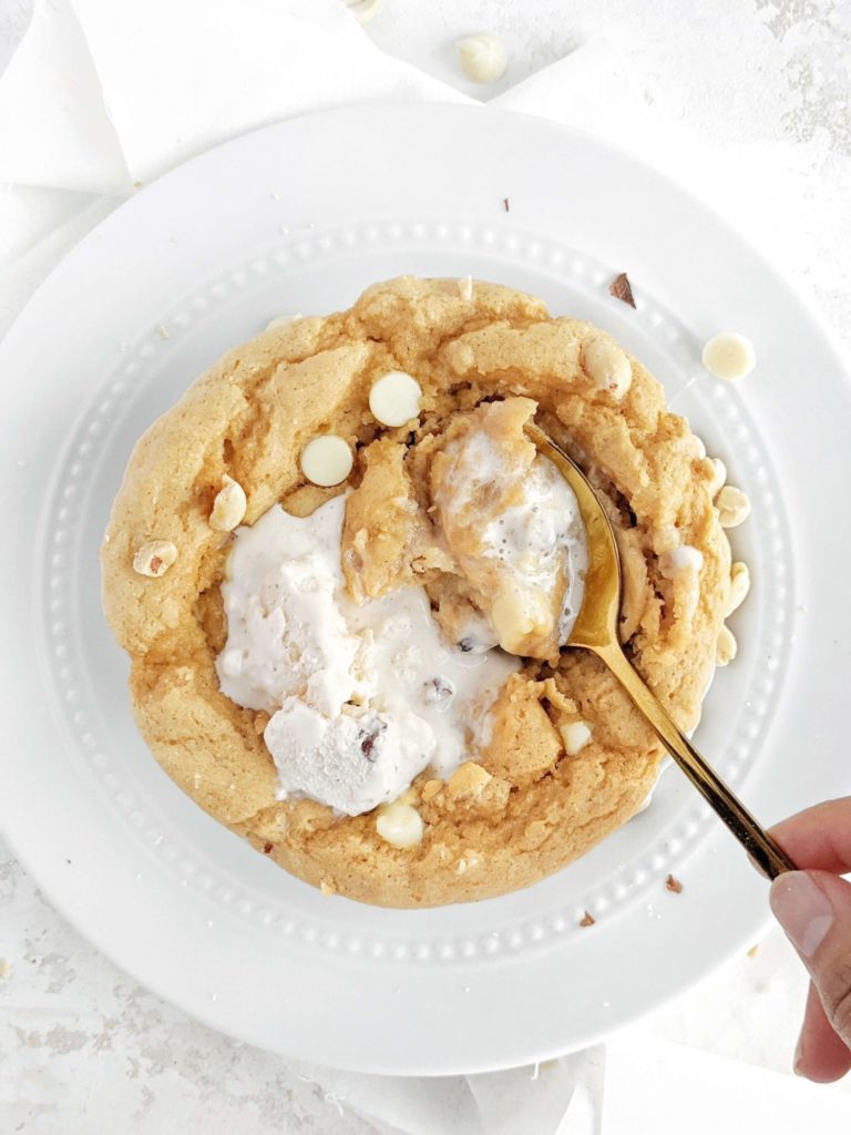 An actually simple super fudgy Peanut Butter Protein Mug Cake made with a load of protein powder and peanut butter powder, and no flour! This half baked fudgy protein mug cake is a great low carb and low calorie dessert.