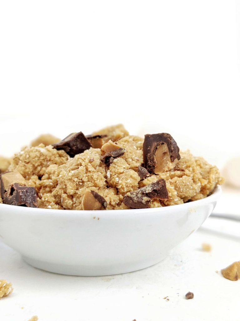An easy, no bake edible Peanut Butter Cup Protein Cookie Dough with oat flour, protein powder, peanut butter powder and chopped candy! This healthy Reese’s cookie dough is perfect for a single serve snack or dessert. Gluten free, Sugar free, Vegan too!