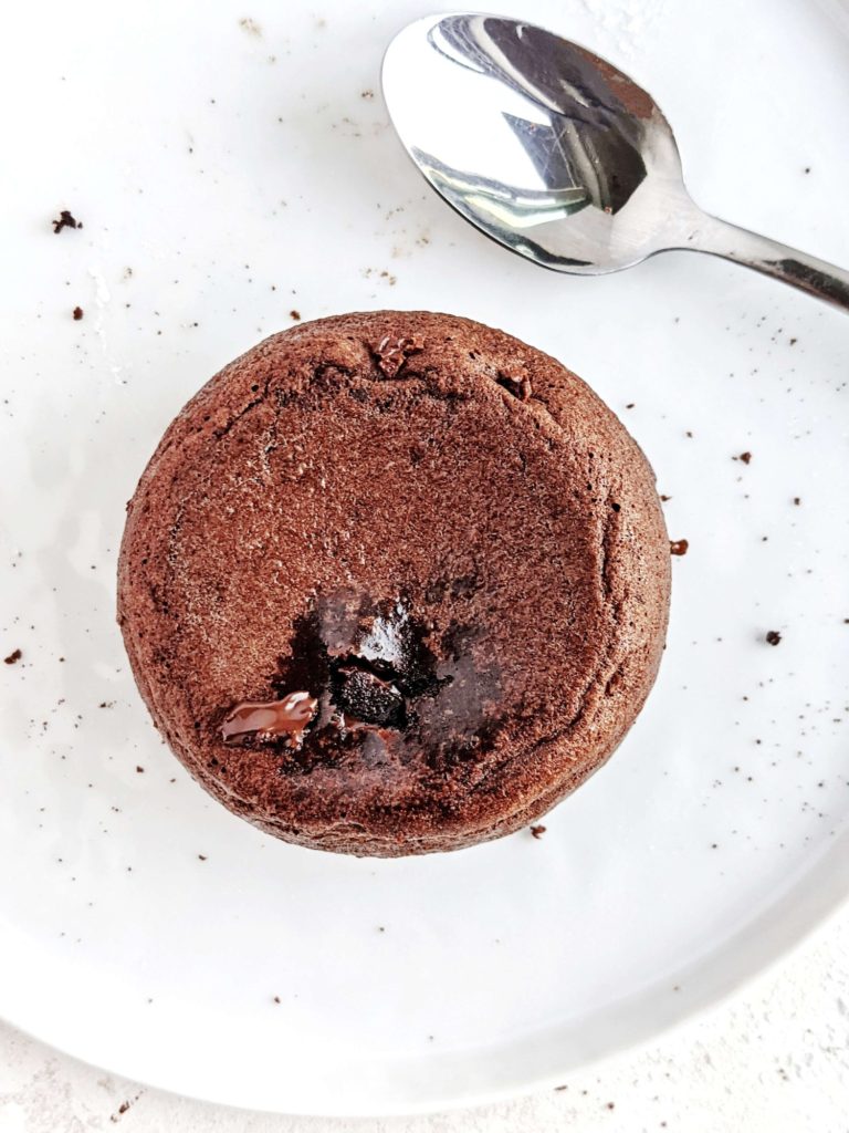 A rich and luxurious Air Fryer Chocolate Lava Cake with that gooey molten chocolate center! This healthy air fryer lava cake is made with cocoa powder and protein powder, and is a great dessert for one.