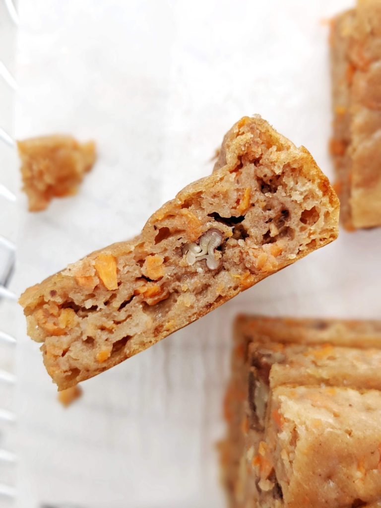 Dense, chewy and light Carrot Cake Protein Blondies with slight crunch of pecans. These healthy carrot cake blondies are made with protein powder, and have no butter; Gluten free, Vegan and sugar free too!