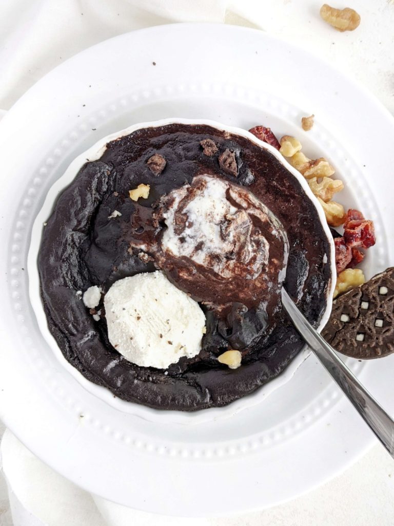 An indulgent Half Bake Oreo Protein Fudge Brownie with a ton of protein powder and no flour! This cookies and cream fudge brownie is a perfect single serve healthy, gluten free and keto protein dessert.