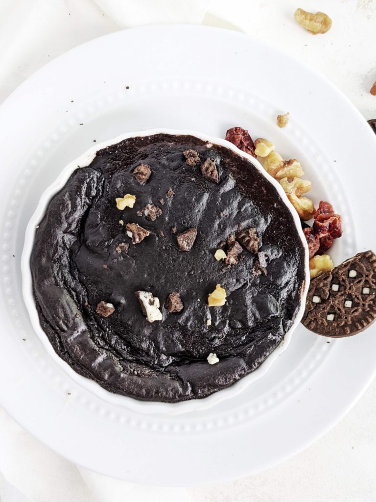 An indulgent Half Bake Oreo Protein Fudge Brownie with a ton of protein powder and no flour! This cookies and cream fudge brownie is a perfect single serve healthy, gluten free and keto protein dessert.
