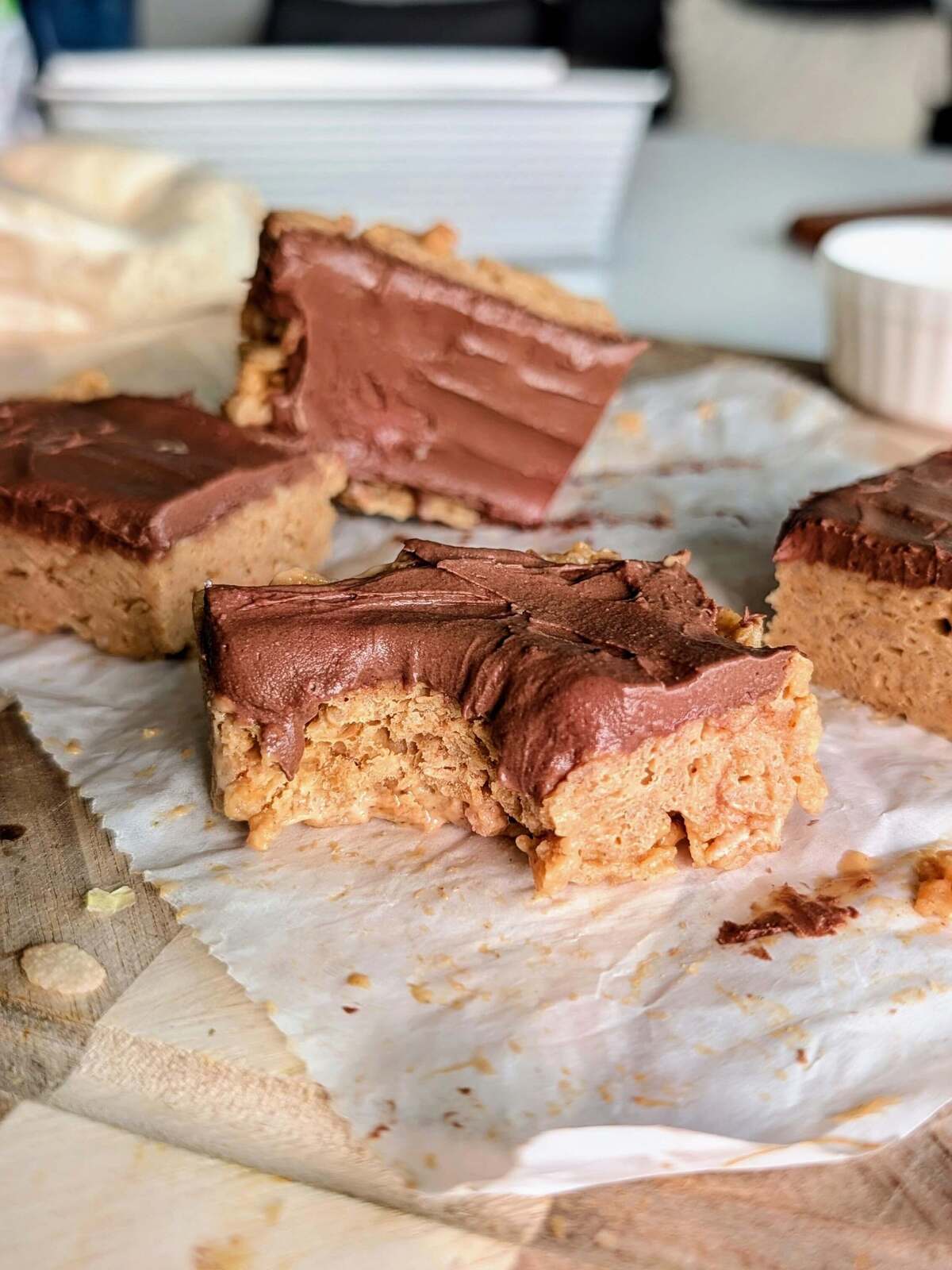 Protein rice krispies no marshmallows - 14g of protein, 154 calories, with a peanut butter flavor and chocolate ganache on top. No sticky marshmallow mess, no sugar crash, and honestly way more satisfying than the original.