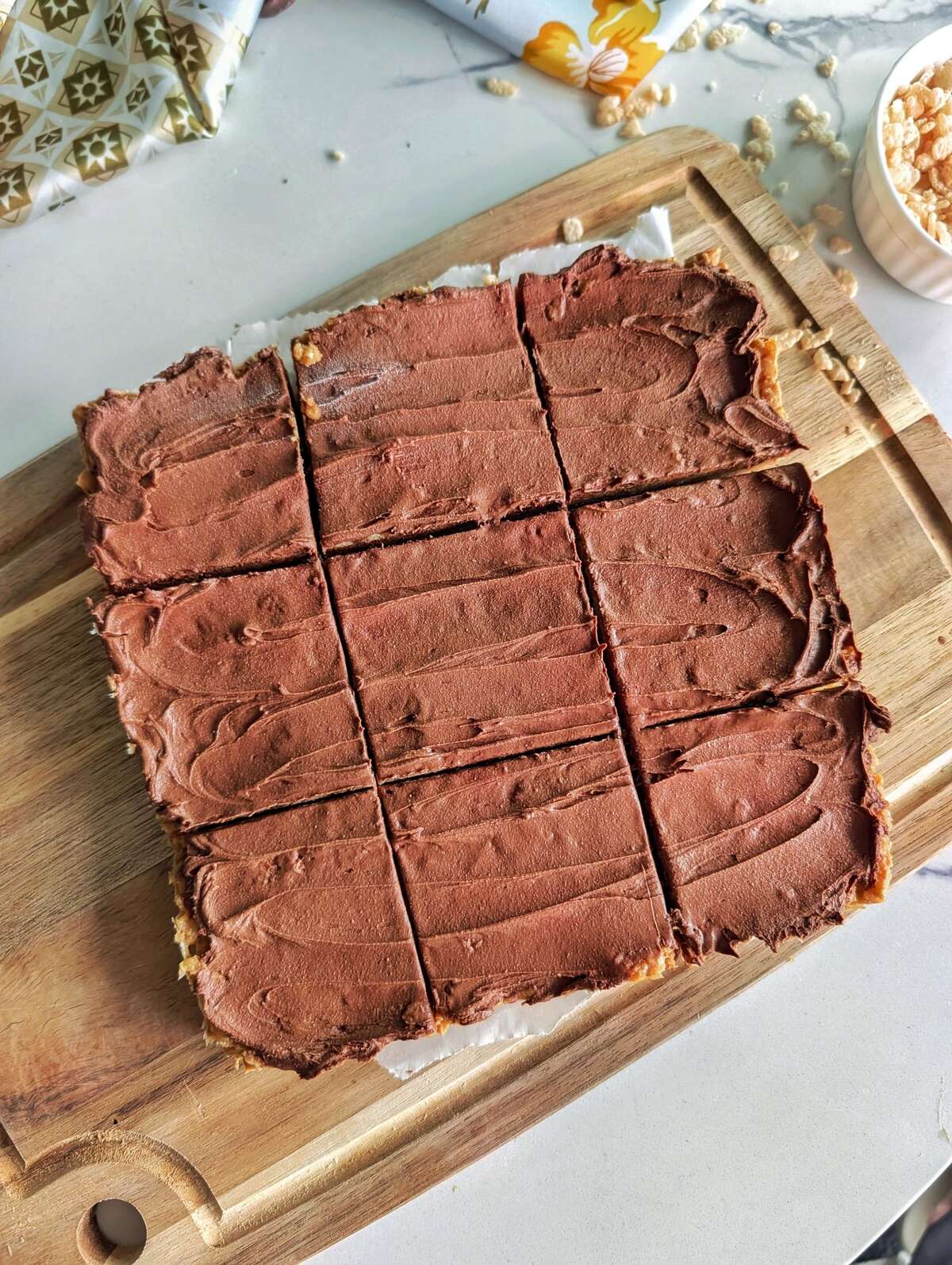 Protein rice krispies no marshmallows - 14g of protein, 154 calories, with a peanut butter flavor and chocolate ganache on top. No sticky marshmallow mess, no sugar crash, and honestly way more satisfying than the original.