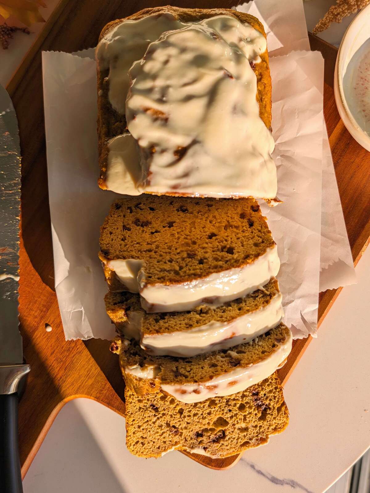 Pumpkin bread with pancake mix made in one bowl and extra high protein with Greek yogurt and protein powder. No oil, no sugar added and done in under an hour with a 2-ingredient protein glaze too.
