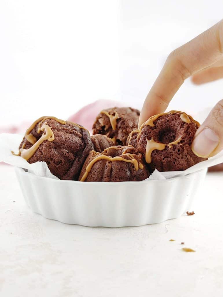 Just unbelievably soft and moist Mini Chocolate Protein Cakes with a load of protein powder, and no oil, sugar, milk or eggs! This healthy protein mini bundt cake recipe is gluten free, sugar free and Vegan too!