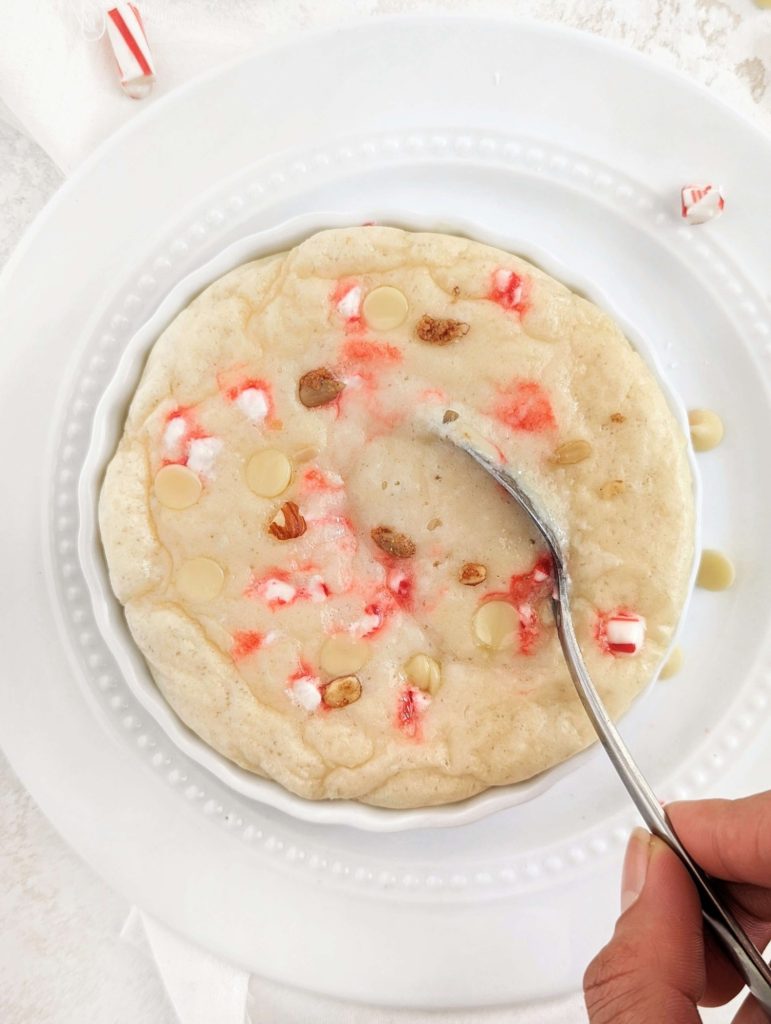 A perfect White Chocolate Peppermint Protein Mug Cake for an easy and healthy Christmas treat! This peppermint mug cake has 5 ingredients, the toppings and is a keto-friendly, and gluten free dessert for one.