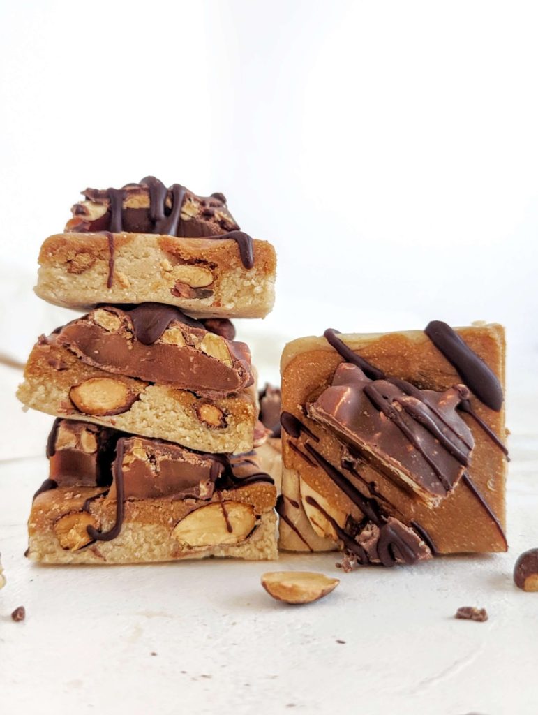 Easy homemade Caramel Almond Protein Bars with flavor and texture but no sugar! These healthy caramel protein bars use protein powder, oat flour and peanut butter powder, for a sugar free and gluten free snack.
