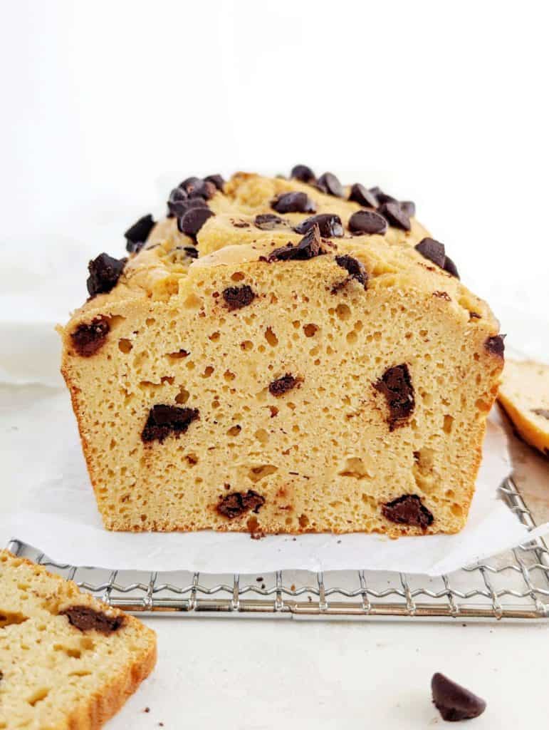 This Protein Cookie Dough Bread is like a big loaf of chocolate chip cookie, but better! A healthy chocolate chip protein bread with peanut butter powder, protein powder, no oil or butter, and even sugar free chocolate chips!