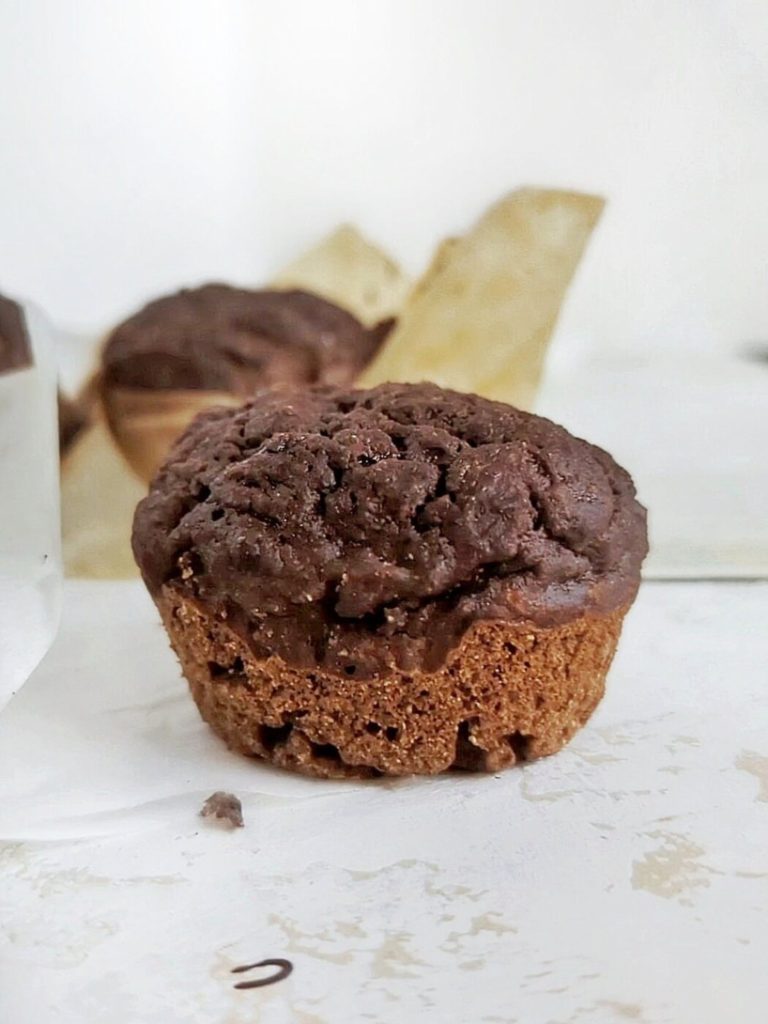 Unbelievably moist and light but Low Calorie Chocolate Protein Muffins! These healthy chocolate muffins use a ton of applesauce and protein powder, and have no oil or sugar. A low fat and low sugar recipe.