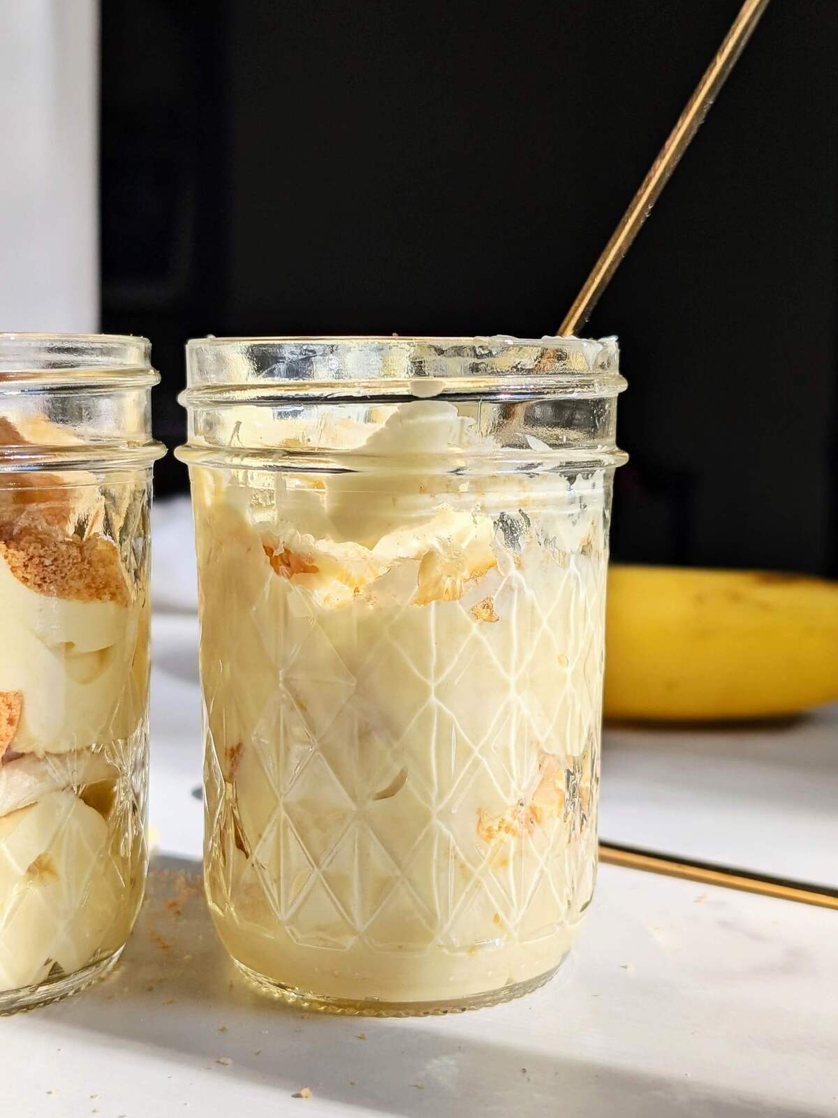 Healthy Protein Banana Pudding with layers of protein powder custard, sugar free vanilla waters and fresh banana. This banana cream pudding is an easy, healthy, no bake recipe without condensed milk or any added sugar.