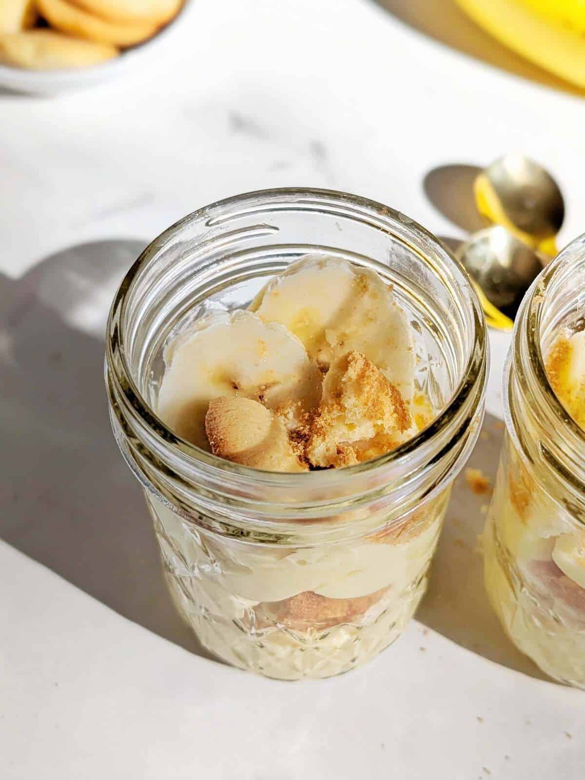 Healthy Protein Banana Pudding with layers of protein powder custard, sugar free vanilla waters and fresh banana. This banana cream pudding is an easy, healthy, no bake recipe without condensed milk or any added sugar.