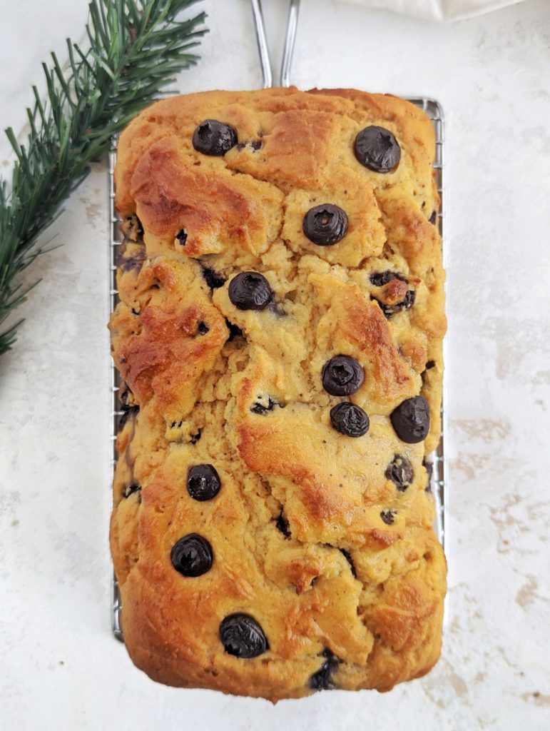 Fresh and festive Protein Blueberry Eggnog Bread for breakfast, post workout or dessert. This healthy eggnog bread uses fresh blueberries, protein powder and almond milk nog, and has no oil or sugar added!