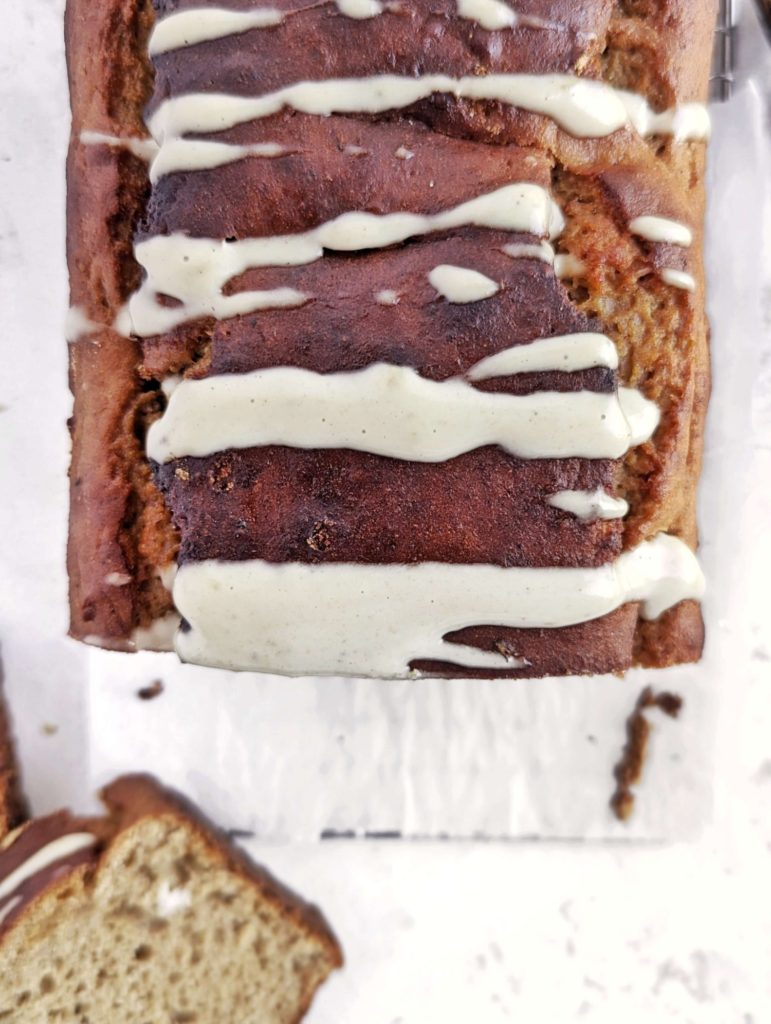 Flavorful and moist Protein Gingerbread Banana Bread with all the spices, but no oil, butter or sugar! This healthy ginger banana bread uses protein powder and monkfruit for sweetness, and a ton of Greek yogurt for that softness. A great holiday bake!